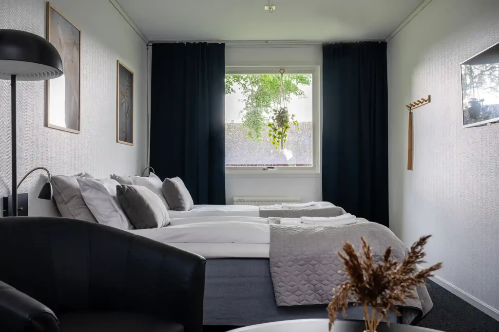 Hotell - bädd med sängar